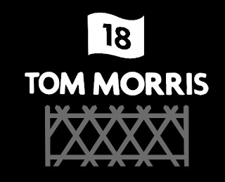 18 TOM MORRIS logo