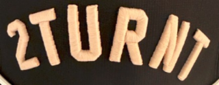 2TURNT logo