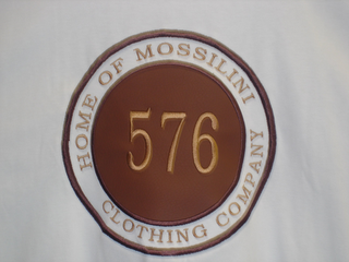 576 HOME OF MOSSILINI CLOTHING COMPANY logo