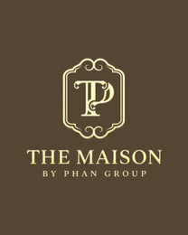 A STYLIZED GOLD MONOGRAM OF THE LETTERS 'T' AND 'P' INTERTWINED INSIDE AN ORNATE GOLD FRAME WITH SCROLLWORK, POSITIONED ABOVE THE GOLD WORDING 'THE MAISON' AND 'BY PHAN GROUP' ON A DARK BROWN BACKGROUND. logo