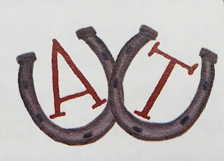 A T logo