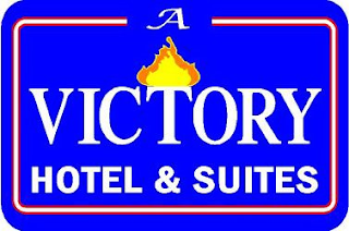 A VICTORY HOTEL & SUITES logo