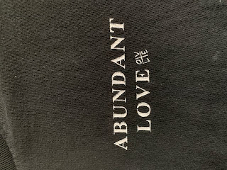 ABUNDANT LOVE L.O.V.E. logo