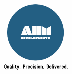 AHM DEVELOPMENTS QUALITY. PRECISION. DELIVERED. logo