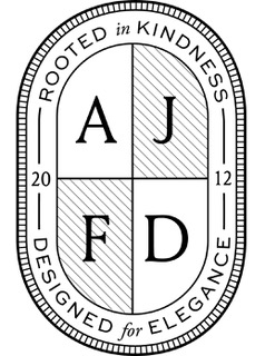 AJFD ROOTED IN KINDNESS DESIGNED FOR ELEGANCE 2012 logo