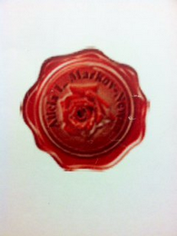 ALICIA L. MARKOV-NEWAN logo