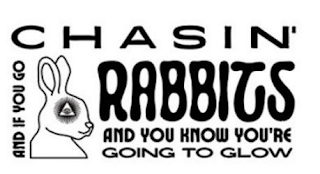 AND IF YOU GO CHASIN' RABBITS AND YOU KNOW YOU'RE GOING TO GLOW logo