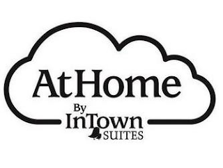 AT HOME BY INTOWN SUITES logo