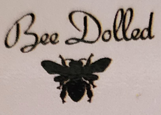 BEE DOLLED logo