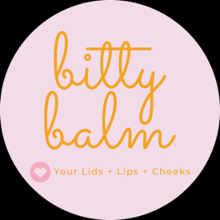 BITTY BALM YOUR LIDS + LIPS + CHEEKS logo