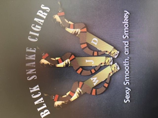 BLACK SNAKE CIGARS W J D SEXY SMOOTH, AND SMOKEY logo