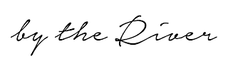BY THE RIVER logo