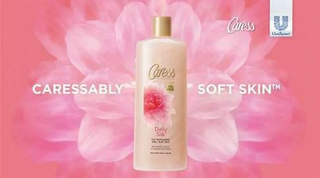 CARESSABLY SOFT SKIN UNILEVER logo