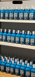 CARIBBEAN MOONSHINE IS ALSO OUR REGISTERED TRADEMARK REG# 7329969 AND SERIAL # 97920586 logo