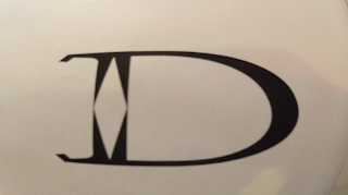D logo