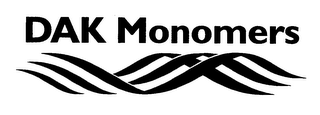 DAK MONOMERS logo