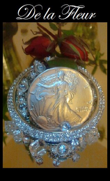 DE LA FLEUR logo