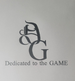 DG DEDICATED TO THE GAME logo