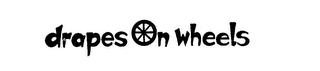 DRAPES ON WHEELS logo