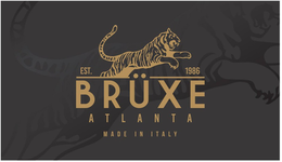 EST. 1986 BRÜXE ATLANTA MADE IN ITALY logo