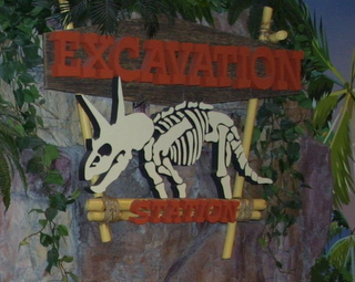 EXCAVATION STATION logo