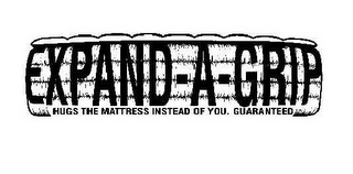 EXPAND-A-GRIP HUGS THE MATTRESS INSTEAD OF YOU. GUARANTEED logo