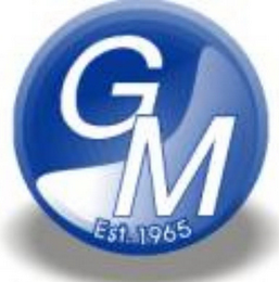 GM, EST 1965 logo