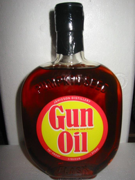 GUN OIL HICKMAN, KENTUCKY JAMIESON DISTILLERY 70% PROOF LIQUEUR ·375 ML PUMPKIN SEED FLASK logo
