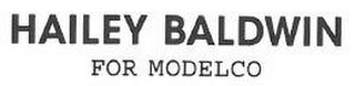 HAILEY BALDWIN FOR MODELCO logo