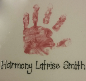 HARMONY LATRISE SMITH logo