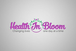 HEALTH IN BLOOM CHANGING LIVES ONE DAY AT A TIME logo