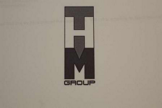 HM GROUP logo