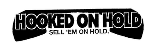 HOOKED ON HOLD SELL 'EM ON HOLD. logo