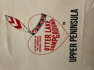 IN THE HEART OF THE HIAWATHA NATIONAL FOREST OTTER LAKE CAMPGROUND logo