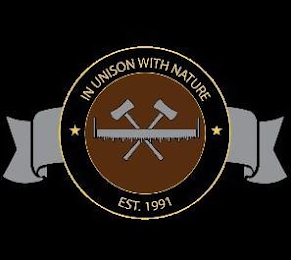 IN UNISON WITH NATURE EST. 1991 logo