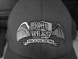 JOHN WEST PRODUCTIONS logo