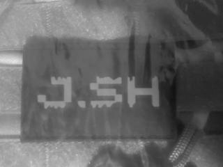 J.SH logo