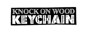 KNOCK ON WOOD KEYCHAIN logo