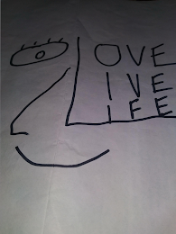 LOVE LIVE LIFE WITH A HEART ON THE RIGHT CHEEK logo