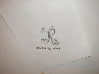 LR THE LIVING ROSARY logo