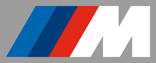 M logo