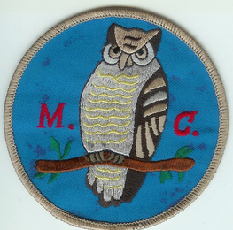 M. C. logo