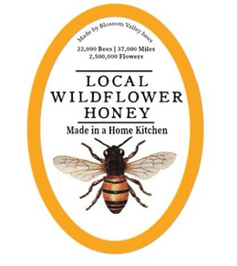 MADE BY BLOSSOM VALLEY BEES 22,000 BEES | 37,000 MILES 2,500,000 FLOWERS LOCAL WILDFLOWER HONEY MADE IN A HOME KITCHEN logo