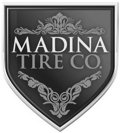 MADINA TIRE CO. logo