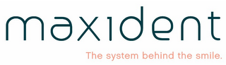 MAXIDENT THE SYSTEM BEHIND THE SMILE. logo