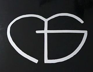 MG logo