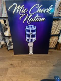 MIC CHECK NATION logo