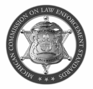MICHIGAN COMMISSION ON LAW ENFORCEMENT STANDARDS MICHIGAN CIRCUMSPICE TUEBOR SI QUAERTS PENINSULAM AMOENAM CIRCUMPICE logo