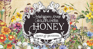 MICHIGAN PURE WILDFLOWER HONEY ROSES OFSILVERBELL logo