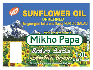 MIKHO PAPA LUCKY FOODS SUNFLOWER OIL UNREFINED THE GEORGIAN TASTE AND FLAVOR FOR THE SALAD OIL FROM KAKHETI DURING STORAGE NATURAL SEDIMENT ALLOWED 1.0L (33/8FL.OZ PRODUCED IN GEORGIA logo